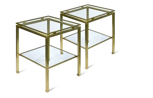 Lot 209 - A pair of two tier brass lamp tables