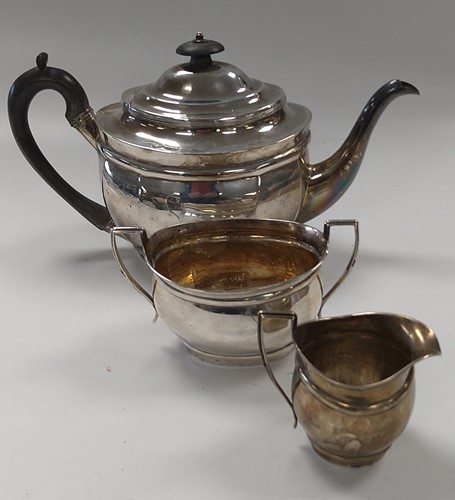 Lot 215 - A silver 3 piece tea set, 700g, (22.5ozt) gross