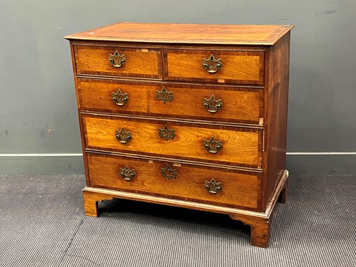 Lot 544 - An 18th century walnut chest of drawers, some...