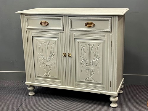 Lot 435 - A painted pine side cabinet, with two frieze...