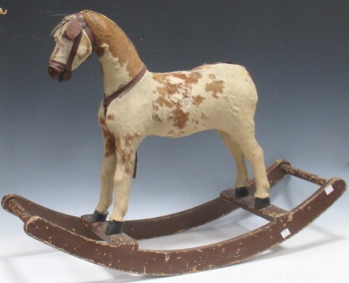 Lot 513 - A small early 20th century rocking horse,...