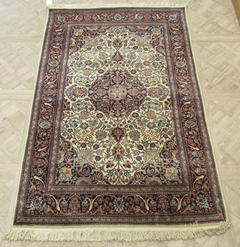 Lot 612 - Two similar Kerman style rugs 200 x 125cm and...