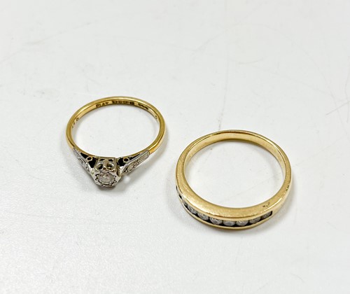 Lot 201 - A diamond set half hoop style ring, stamped...
