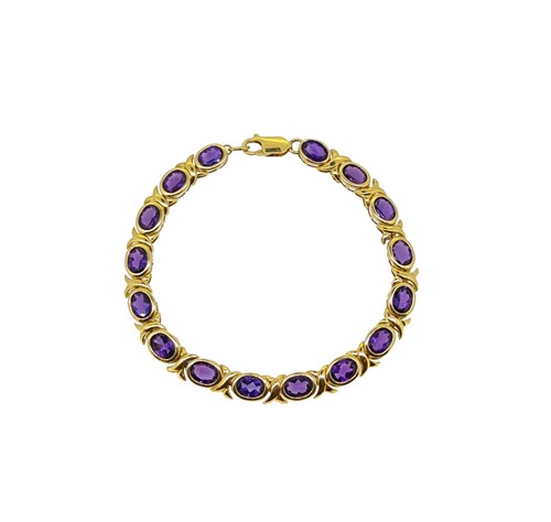 Lot 91 - An amethyst line bracelet