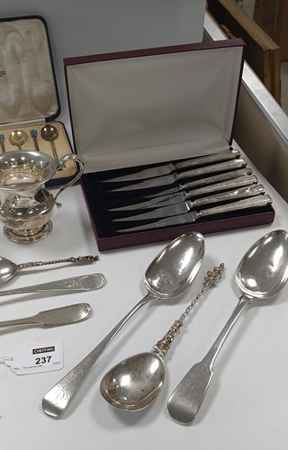 Lot 237 - A collection of silverware including a...