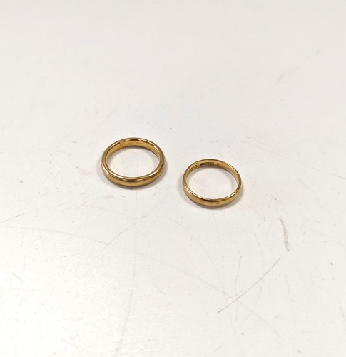 Lot 202 - Two hallmarked 22ct gold wedding bands, gross...