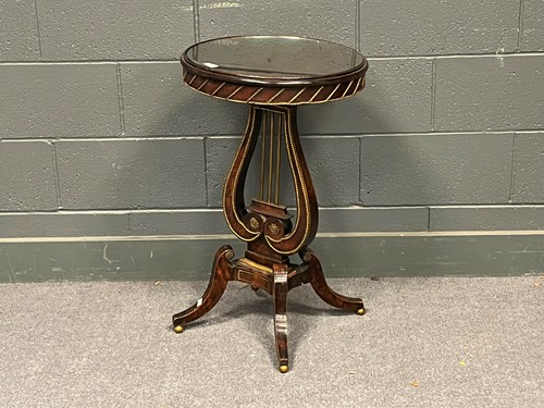 Lot 585 - A Regency style mahogany and brass applied...