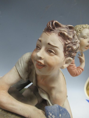 Lot 21 - A large modern Capo di Monte group of yound...