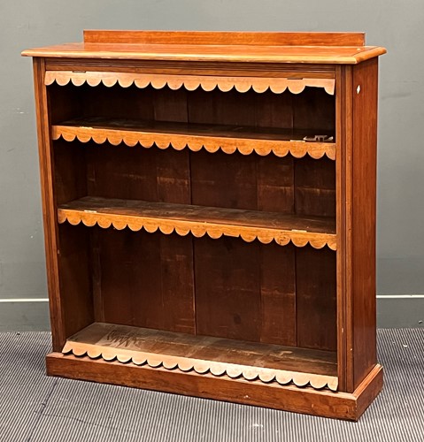 Lot 459 - A late 19th century walnut open bookcase, the...