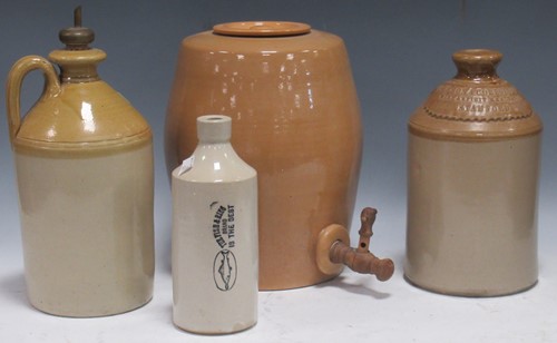 Lot 189 - A collection of four stoneware beer jars, one...