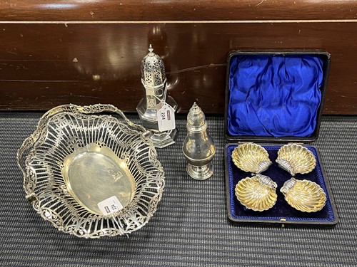 Lot 224 - A silver swing handled cake basket, together...