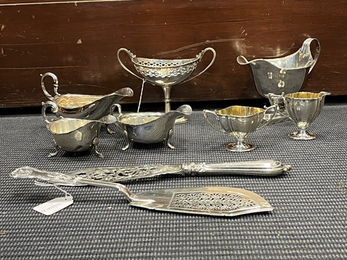 Lot 222 - A collection of silverware including a sugar...