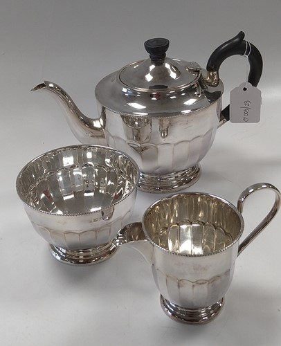 Lot 221 - A silver three-piece tea set, 778.2g (25ozt)...