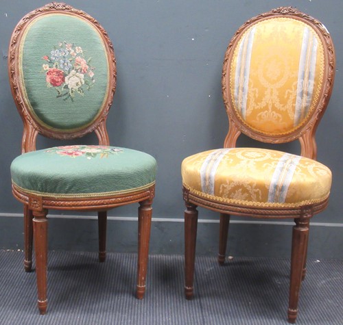 Lot 557 - Two similar Louis XVI style carved chairs