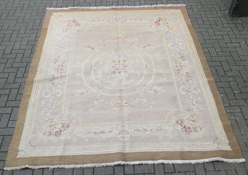 Lot 605 - A French Aubusson wool rug 303 x 248cm