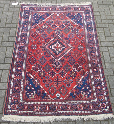 Lot 619 - A Persian Tabriz type rug with central...