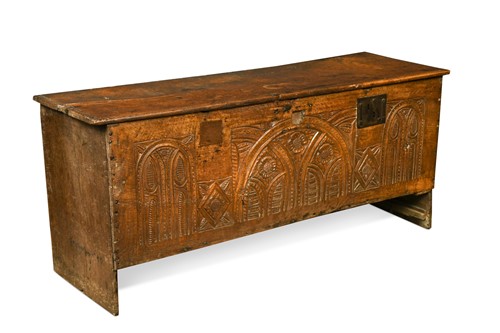 Lot 477 - An early carved oak church coffer, circa 1480-1550