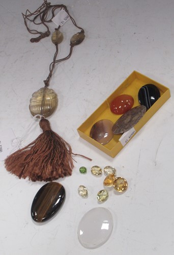 Lot 222 - A moulded glass 'bug' pendant strung with two...