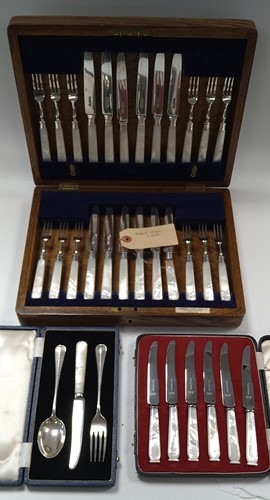 Lot 210 - A cased set of twelve pairs of silver dessert...