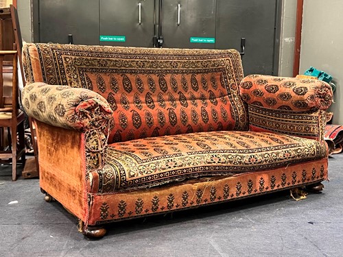 Lot 466 - A three seater sofa drop end sofa, circa 1900,...