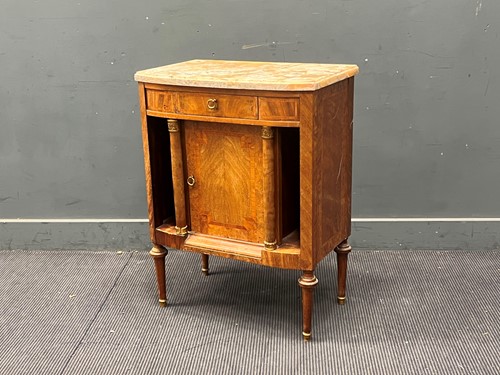 Lot 447 - A Continental marble topped commode with...