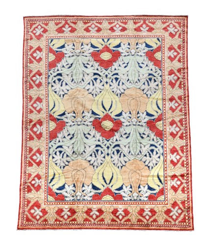 Lot 162 - In the manner of C. F. A. Voysey, a large hand-knotted wool carpet, 20th century