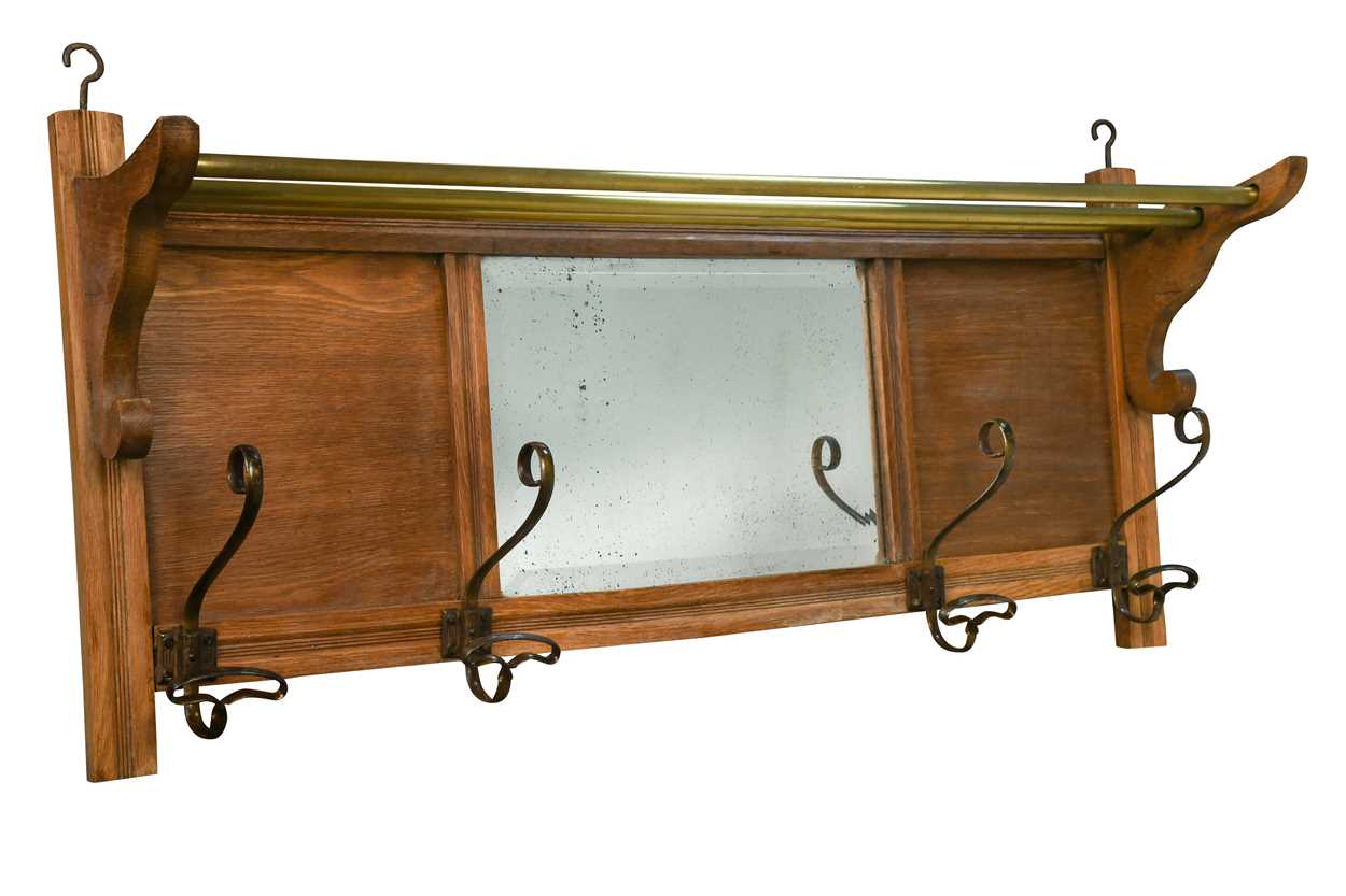 Lot 640 - A 'Pullman' style hat/coat rack, circa 1910,