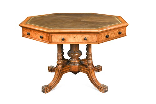 Lot 780 - A Victorian walnut octagonal library table, by Gillow & Co