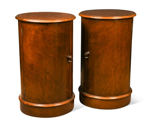 Lot 603 - A pair of Victorian style mahogany cylindrical bedside pot cupboards
