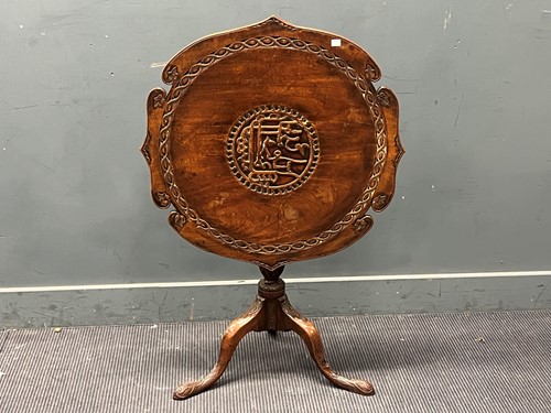 Lot 369 - A mahogany snap top tripod table, with carved...