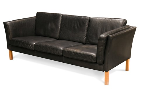 Lot 207 - A Danish black leather three seat sofa