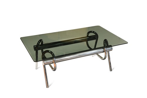Lot 450 - A glass topped chrome coffee table