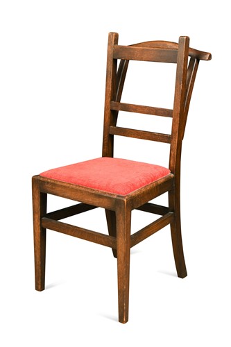 Lot 260 - Attributed to Arthur W. Simpson (1857-1922) of Kendal, an oak valet chair