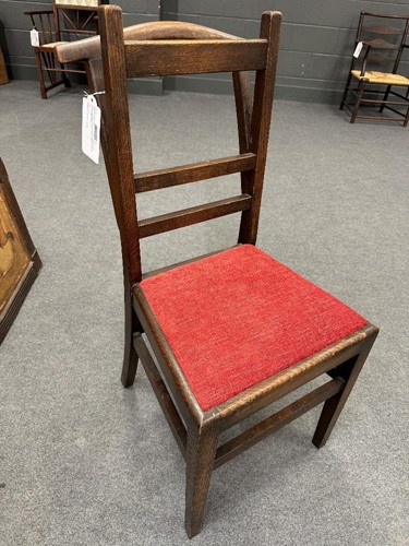 Lot 260 - Attributed to Arthur W. Simpson (1857-1922) of Kendal, an oak valet chair