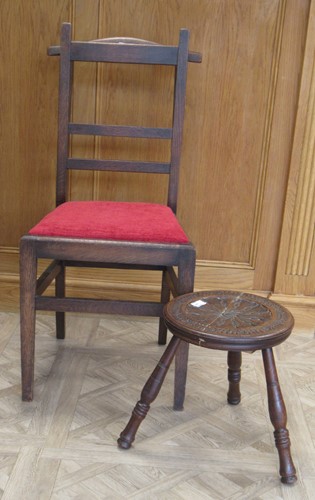 Lot 260 - Attributed to Arthur W. Simpson (1857-1922) of Kendal, an oak valet chair