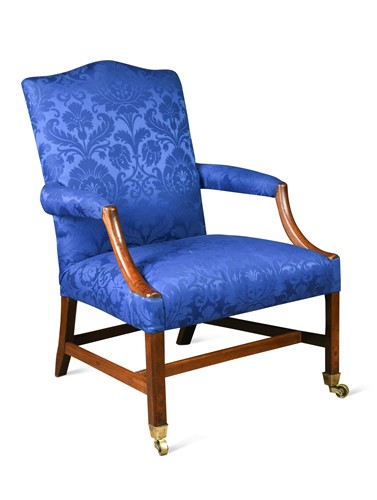 Lot 589 - A George III mahogany Gainsborough library armchair