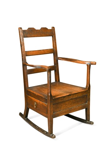 Lot 469 - An oak lambing armchair, 19th century