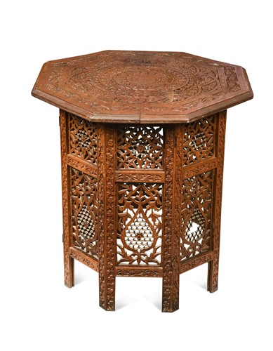 Lot 649 - An Anglo-Indian carved wood occasional table