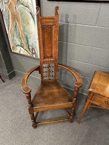 Lot 161 - Attributed to William Bartlett for Liberty & Co., an oak Shakespeare Chair