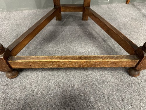 Lot 161 - Attributed to William Bartlett for Liberty & Co., an oak Shakespeare Chair