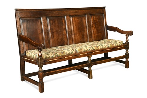 Lot 473 - An oak panel backed settle, 18th century