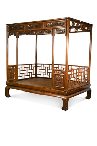 Lot 296 - A Chinese carved elm wood wedding bed, late Qing Dynasty