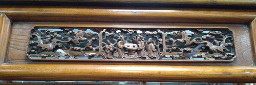 Lot 296 - A Chinese carved elm wood wedding bed, late Qing Dynasty