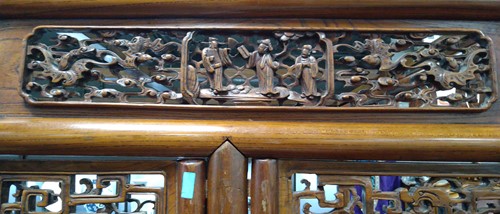 Lot 296 - A Chinese carved elm wood wedding bed, late Qing Dynasty