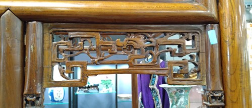 Lot 296 - A Chinese carved elm wood wedding bed, late Qing Dynasty