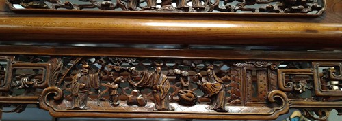 Lot 296 - A Chinese carved elm wood wedding bed, late Qing Dynasty