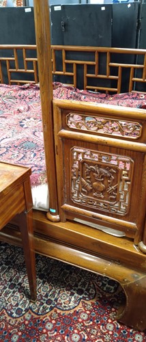 Lot 296 - A Chinese carved elm wood wedding bed, late Qing Dynasty