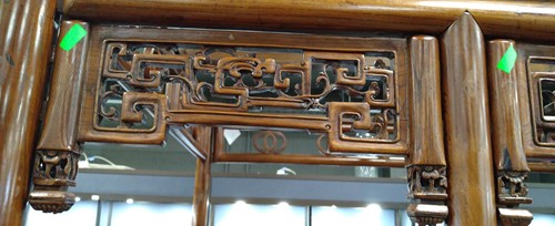 Lot 296 - A Chinese carved elm wood wedding bed, late Qing Dynasty