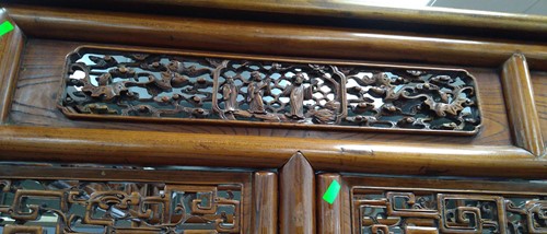 Lot 296 - A Chinese carved elm wood wedding bed, late Qing Dynasty