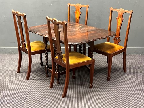Lot 406 - Four Edwardian inlaid mahogany dining chairs...